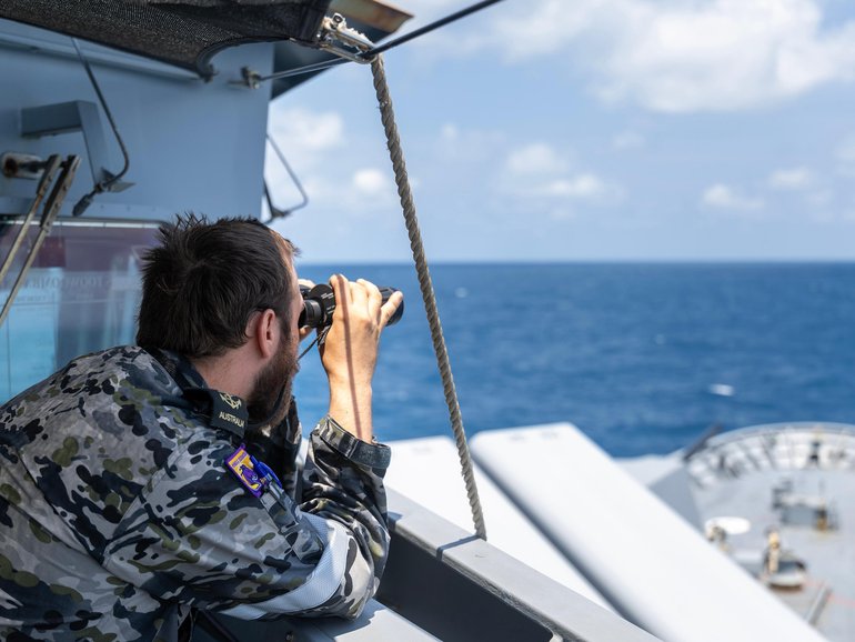 Leading Seaman Boatswains Mate Jack Dimmack looks out at the horizon as bridge watch on HMAS Toowoomba while in the South China Sea. LSIS Zac Dingle