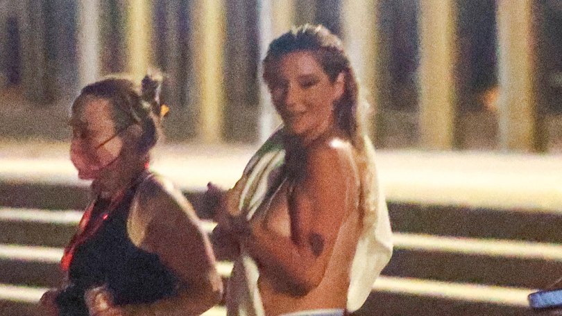 Global pop star Kesha has cooled off with a late-night swim at Bondi Beach after lighting up the stage in Sydney.

