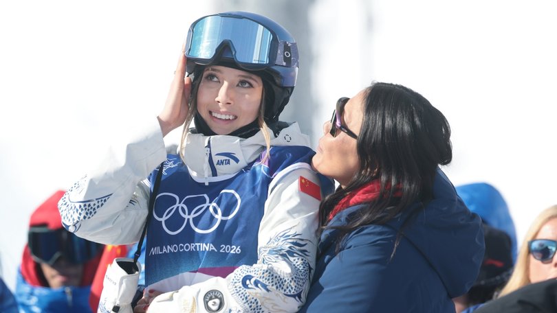 Eileen Gu hugs her mother during the halfpipe final.
