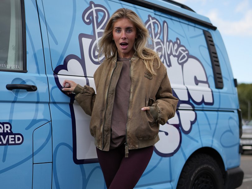 Bonnie Blue next to her Bang Bus