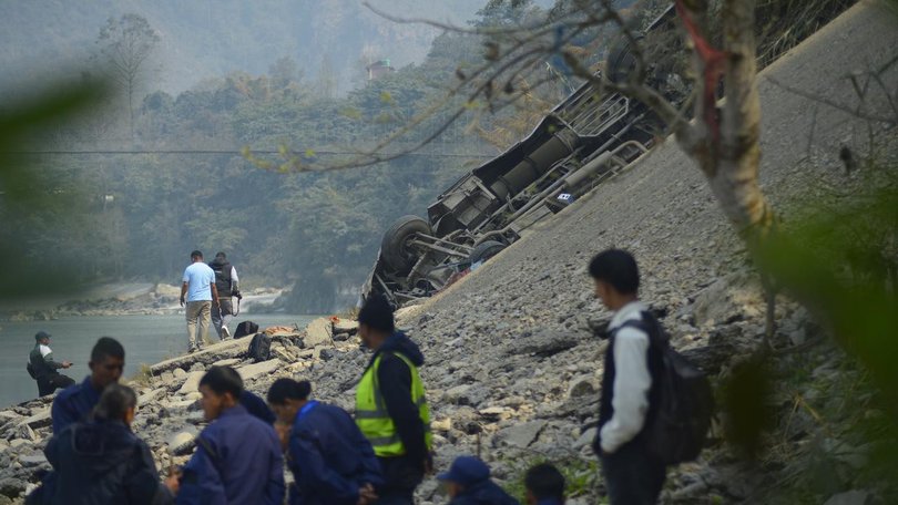 Dozens of people were on board a bus that drove off a highway overnight in Nepal. 