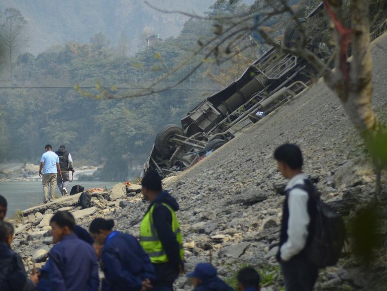 Dozens of people were on board a bus that drove off a highway overnight in Nepal. 