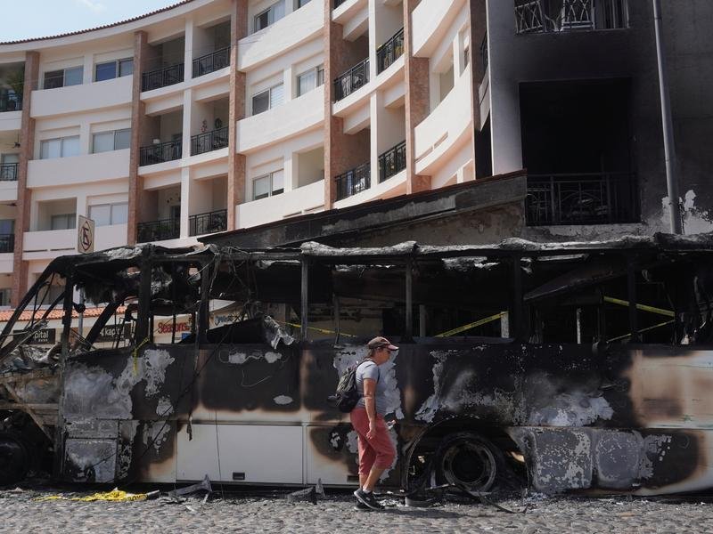 Gang violence erupted after the killing of drug cartel leader 'El Mencho'. (EPA PHOTO)