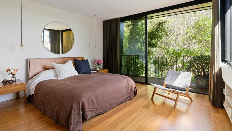 One of the five bedrooms.