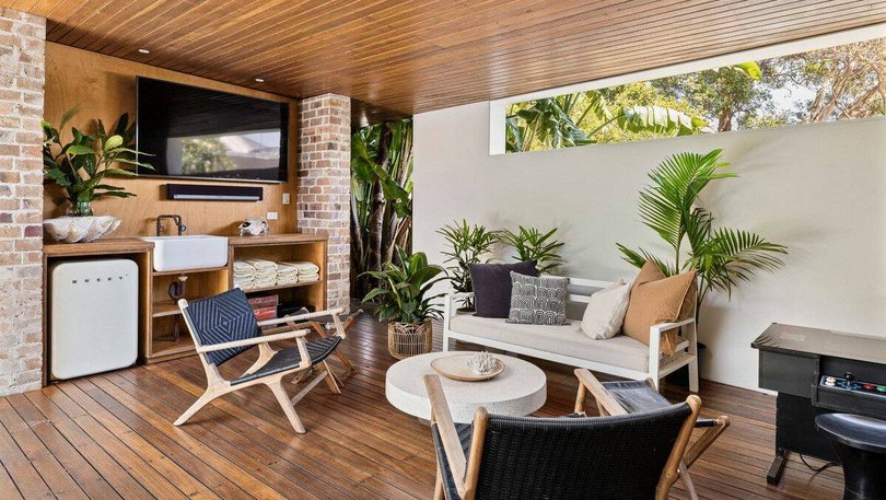 The pool house at the rear of the property.