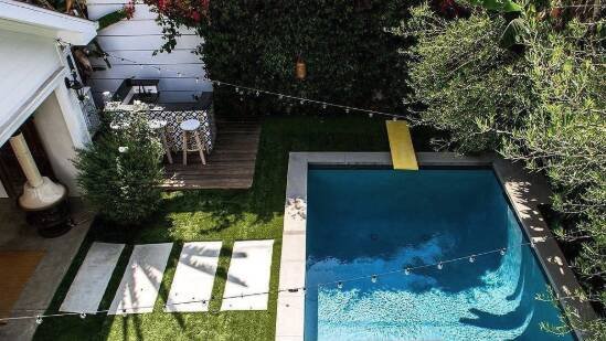 The outdoor spaces include a swimming pool, open-air cabana and tiled bar. Pic: Instagram/architecturalateliers.