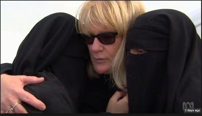 Family bond: Karen Nettleton hugs her grandchildren, Zaynab Sharrouf, 17 and Hoda Sharrouf, 16, who were taken to Syria by their dad, the late Khaled Sharrouf, below Main picture; ABC