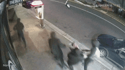 A man was allegedly grabbed off the street by four masked men.