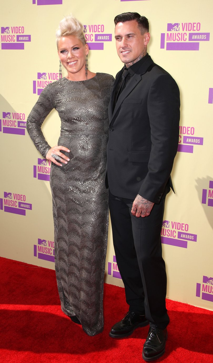 Singer Pink and professional motocross rider Carey Hart arrive at the 2012 MTV Video Music Awards.