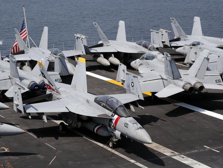 The F-18 can conduct air-to-air and air-to-ground missions, carrying bombs and missiles. (EPA PHOTO)