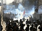 Protesters clashed with Pakistan security forces while rioting against US-Israeli attacks on Iran.