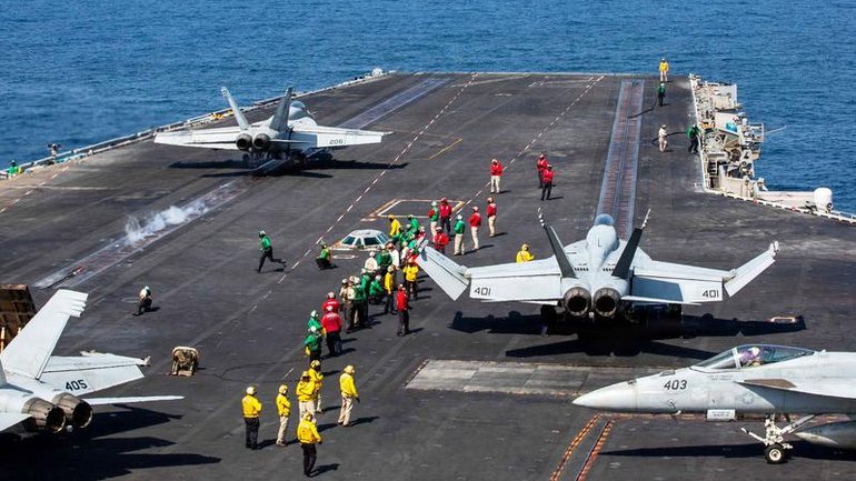 The US denies claims that the USS Abraham Lincoln aircraft carrier was hit with ballistic missiles.