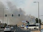 Smoke billows from a reported Iranian strike in Doha on Sunday. The conflict in the Middle East is spilling into global markets and stocks.