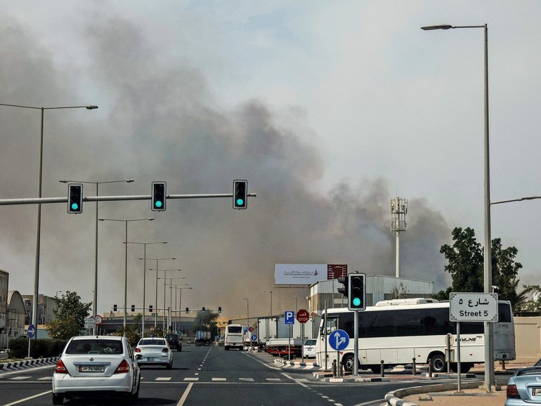 Smoke billows from a reported Iranian strike in Doha on Sunday. The conflict in the Middle East is spilling into global markets and stocks.