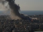 Flames and smoke rise from Israeli airstrikes on Dahiyeh, a southern suburb of Beirut.