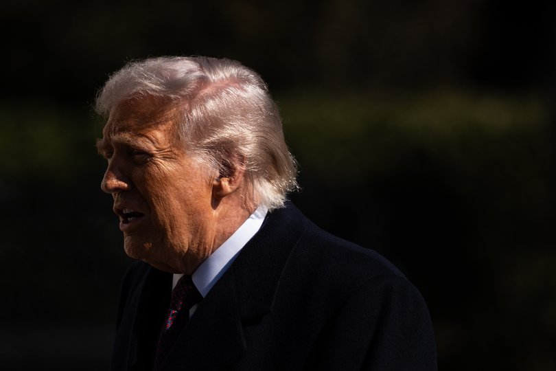 President Donald Trump speaks to reporters outside the White House in Washington, February 27.