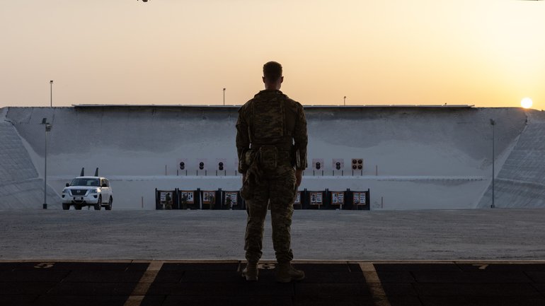 An Australian Army solder looks over the range near Headquarters Middle East, which was hit by an Iranian drone attack over the weekend.