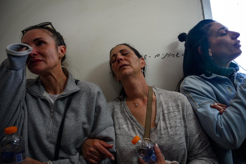 Mourners grieve during a funeral for a mother and her adult daughter, Sara Elimelech and Ronit Elimelech, killed in Iranian missile strike on March 2, 2026 in Beit Shemesh, Israel.