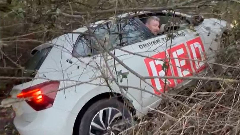 Shocking photos show the moment a driving instructor, who was four times over the legal alcohol limit, crashed into a roadside ditch on his way to a lesson. 