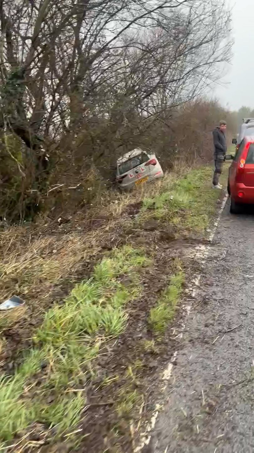 ### NOTE FEE APPLIES PER USAGE ### The moment a drunk driving instructor crashed into a ditch on the way to his first lesson has been caught on camera. The embarrassing incident happened when 54-year-old Timothy Howells, a driving instructor from Carmarhenshire, was on his way to pick up a learner when his car veered off the road. Howells was found to be four times over the legal limit on Februrary 20 when his car crashed into a ditch off the A484 between Pembrey to Kidwelly, West Wales. Picture: WALES NEWS SERVICE