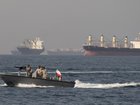 Iranian Navy soldiers at an armed speed boat in Persian Gulf near the strait of Hormuz about 1320km south of Tehran, in April 2019. 