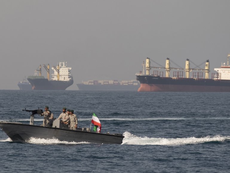 Iranian Navy soldiers at an armed speed boat in Persian Gulf near the strait of Hormuz about 1320km south of Tehran, in April 2019. 
