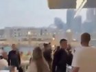 Video seen on social media at an unnamed hotel restaurant shows several diners getting up from their tables and fleeing. X