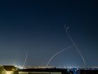 An Israeli Air defense system intercepts a ballistic missile barrage launched from Iran to central Israel.