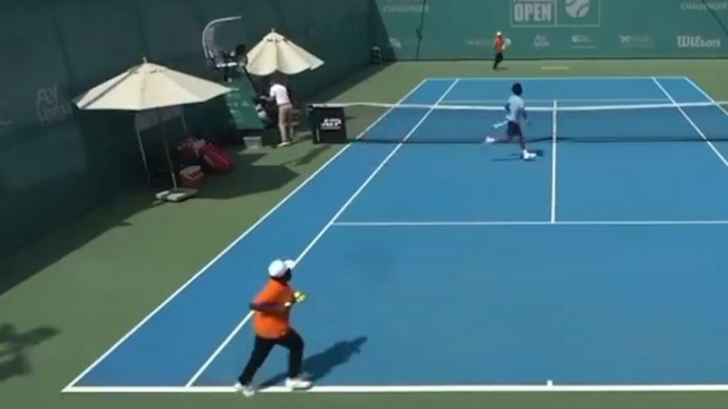 Hayato Matsuoka and Daniil Ostapenkov rush off court in the UAE.