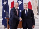 Prime Minister Anthony Albanese greets Canada's Prime Minister Mark Carney at Parliament House on Thursday. 