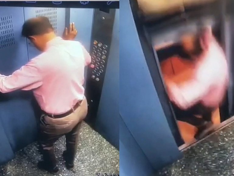 Horror moment man almost falls to his death when lift stops working.