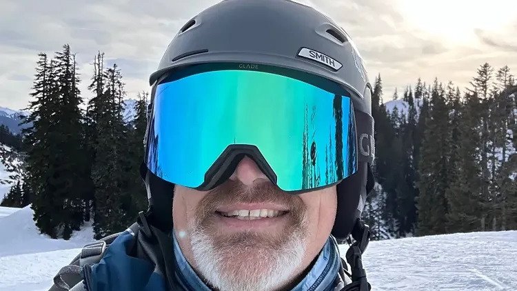 Michael Harris was found after four hours beneath the snow after an avalanche.