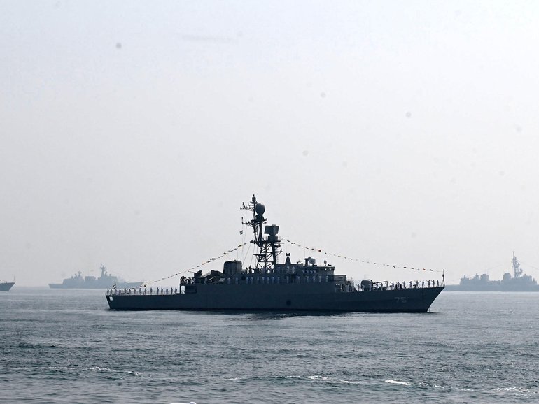 A former Royal Australian Navy officer says the destruction of the Iranian frigate may have been intended to warn China about the costs of launching a broader war.