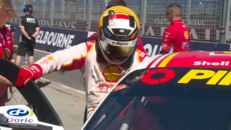 Brodie Kostecki hops out of his car after qualifying with vomit all over his suit.