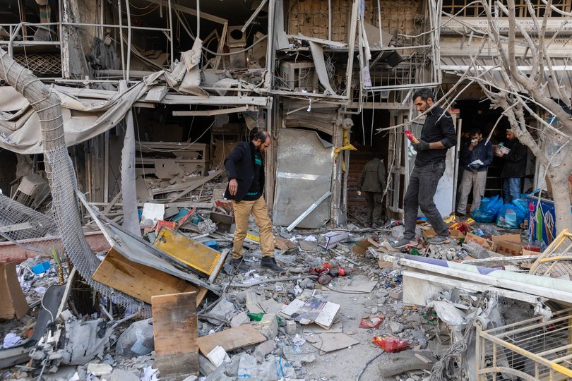 TEHRAN, IRAN - MARCH 2: People sift through debris of shops and residences destroyed by an airstrike on March 2, 2026 in Tehran, Iran. Iran's Supreme Leader, Ayatollah Ali Khamenei, was confirmed killed after the United States and Israel launched a joint attack on Iran on February 28. Iran retaliated by firing waves of missiles and drones at Israel, and targeting U.S. allies in the region. (Photo by Majid Saeedi/Getty Images) *** BESTPIX ***