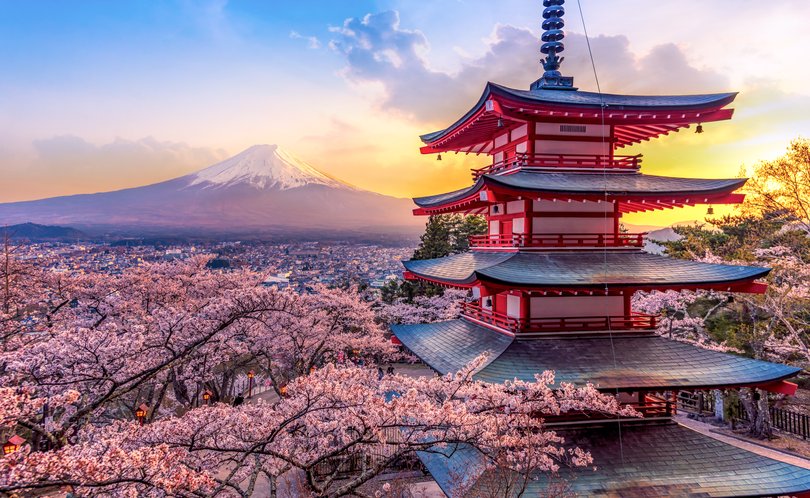 Beautiful view of mountain Fuji and Chureito pagoda at sunset, japan in the spring with cherry blossoms