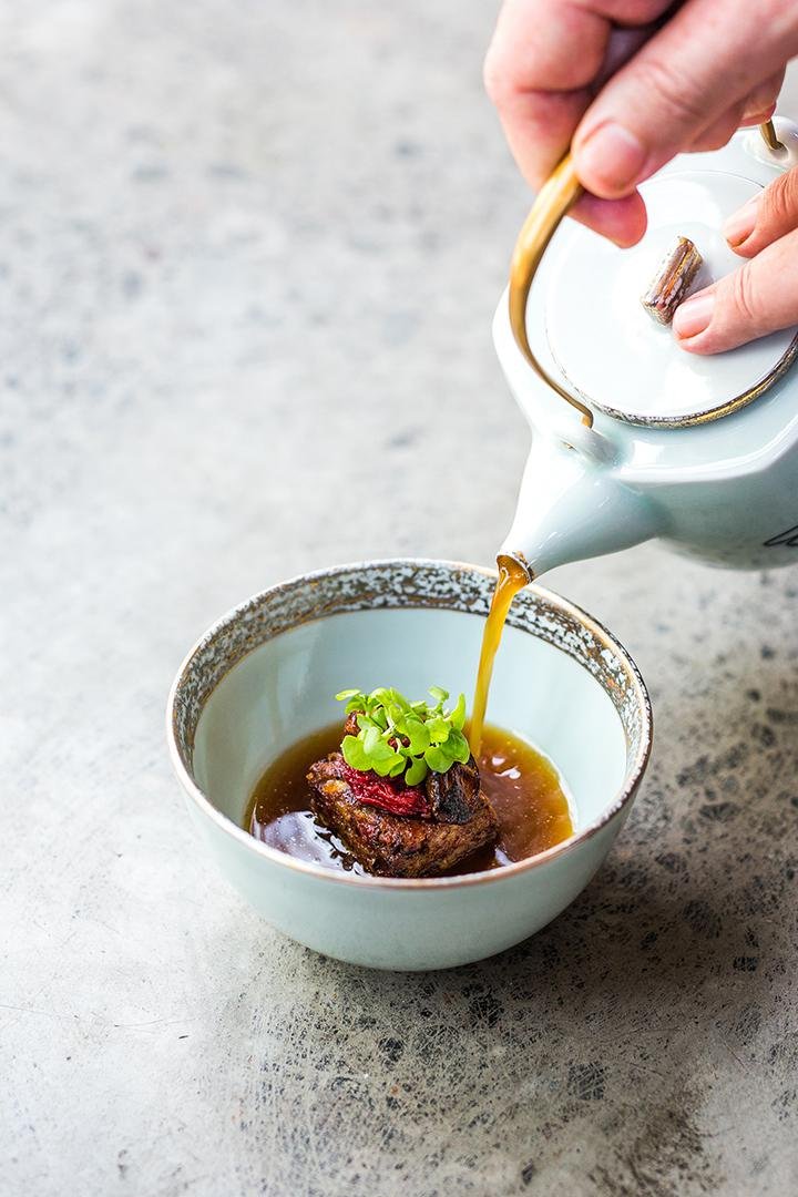 One of the many beautiful offerings, Sop buntut with oxtail and dashi broth, charred onion and tomato raisin.