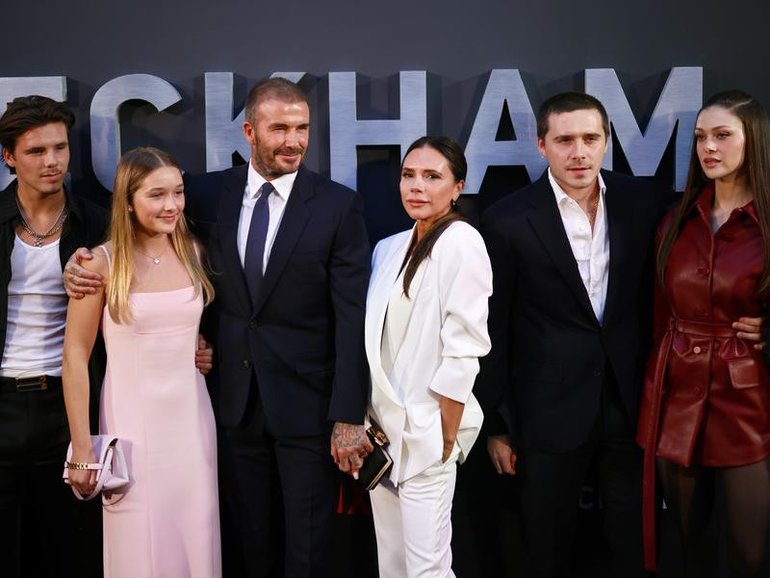 Cruz Beckham (L) says he hopes to reunite with brother Brooklyn (2nd R), amid the family's feud.