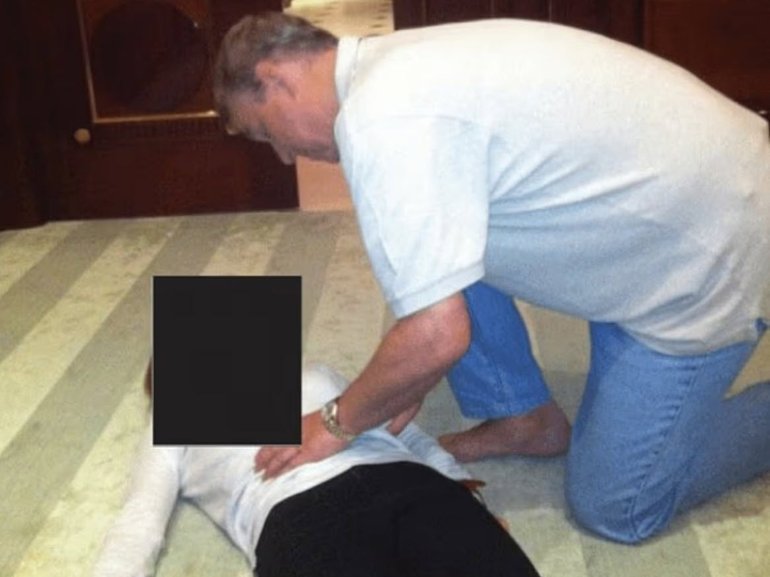 Andrew touching a woman’s stomach as part of  Epstein files photos release.  