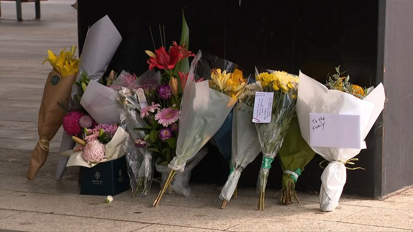 Floral tributes have been left at the scene where Becker died.