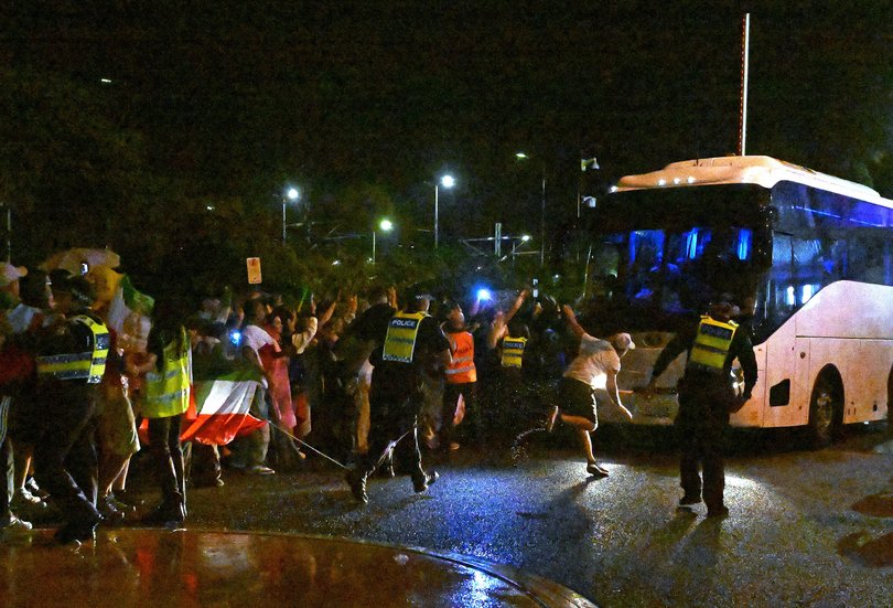 Supporters attempt to block a bus transporting Iranian players following the AFC Women’s Asian Cup Group A match between Iran and Philippines at Gold Coast Stadium on the Gold Coast, Sunday, March 8, 2026.
