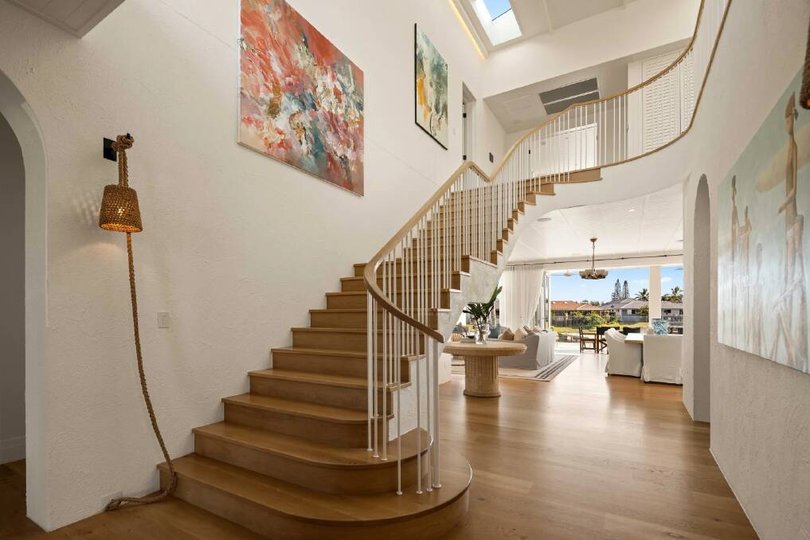 Grand staircase in the entry foyer.