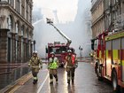 Scottish rail services have been crippled after a fire broke out near a busy Glasgow train station. (AP PHOTO)