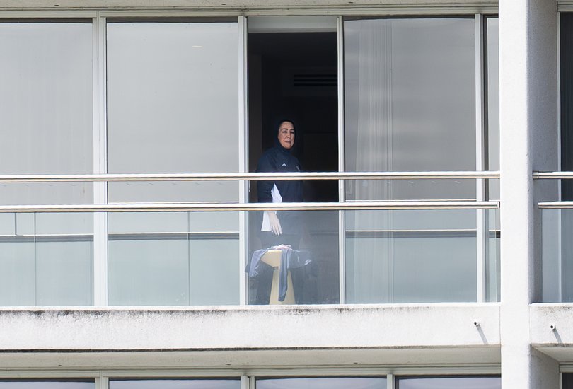 A member of Iran’s women’s soccer team is seen at a hotel room on the Gold Coast. 