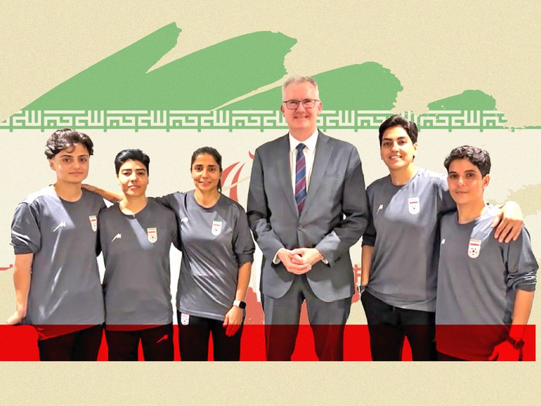 Tony Burke with five women from the Iranian women’s soccer team who have been granted asylum in Australia.