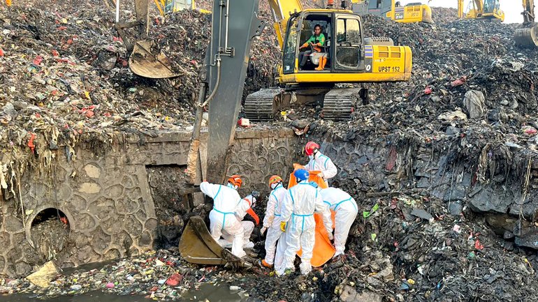 Rescuers working on site after a large garbage mound collapsed at the Bantar Gebang Integrated Waste Processing Site in Bekasi, Indonesia.