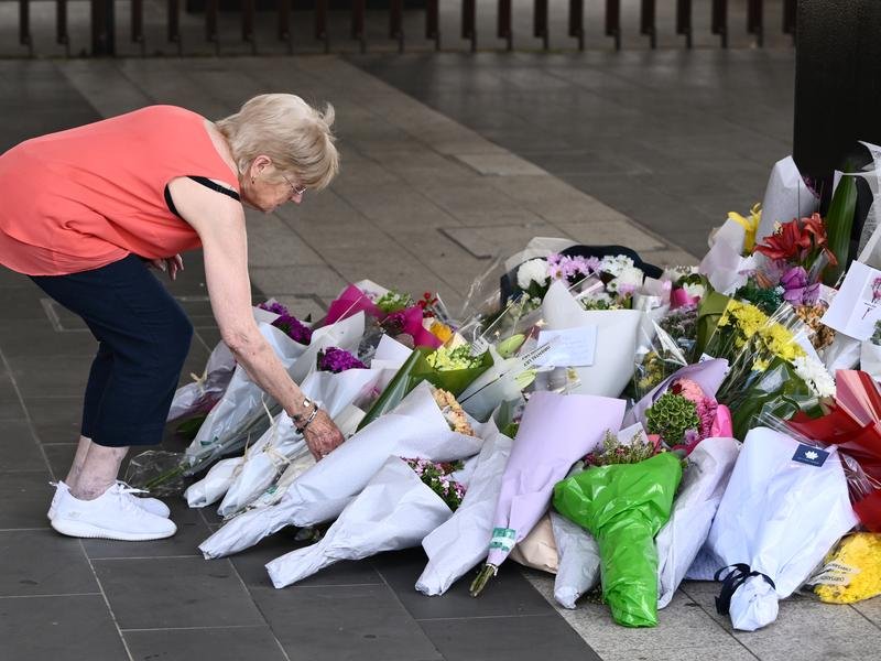 A makeshift memorial to Aidan Becker has been created by locals trying to make sense of his death. 