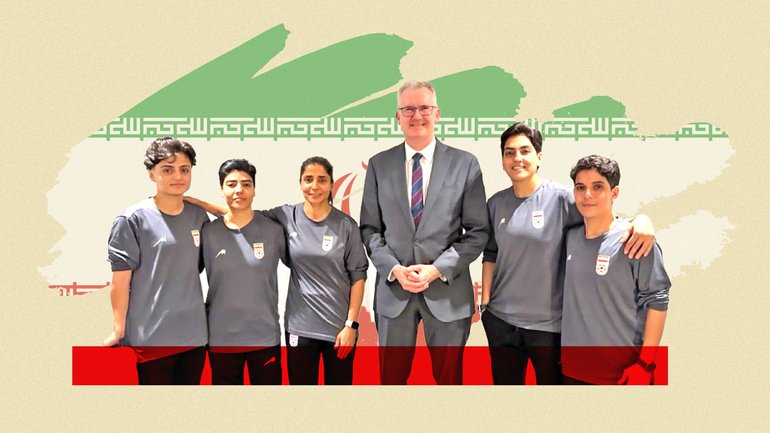 Tony Burke with five women from the Iranian women’s soccer team who have been granted asylum in Australia.