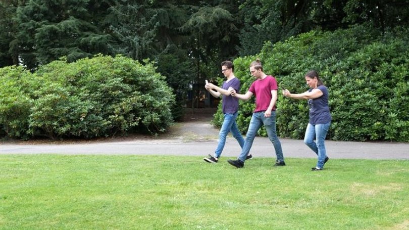 People playing Pokémon Go. 