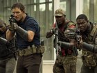 This image released by Amazon shows Chris Pratt, from second left, Edwin Hodge and Sam Richardson in a scene from "The Tomorrow War." (Frank Masi/Amazon via AP)